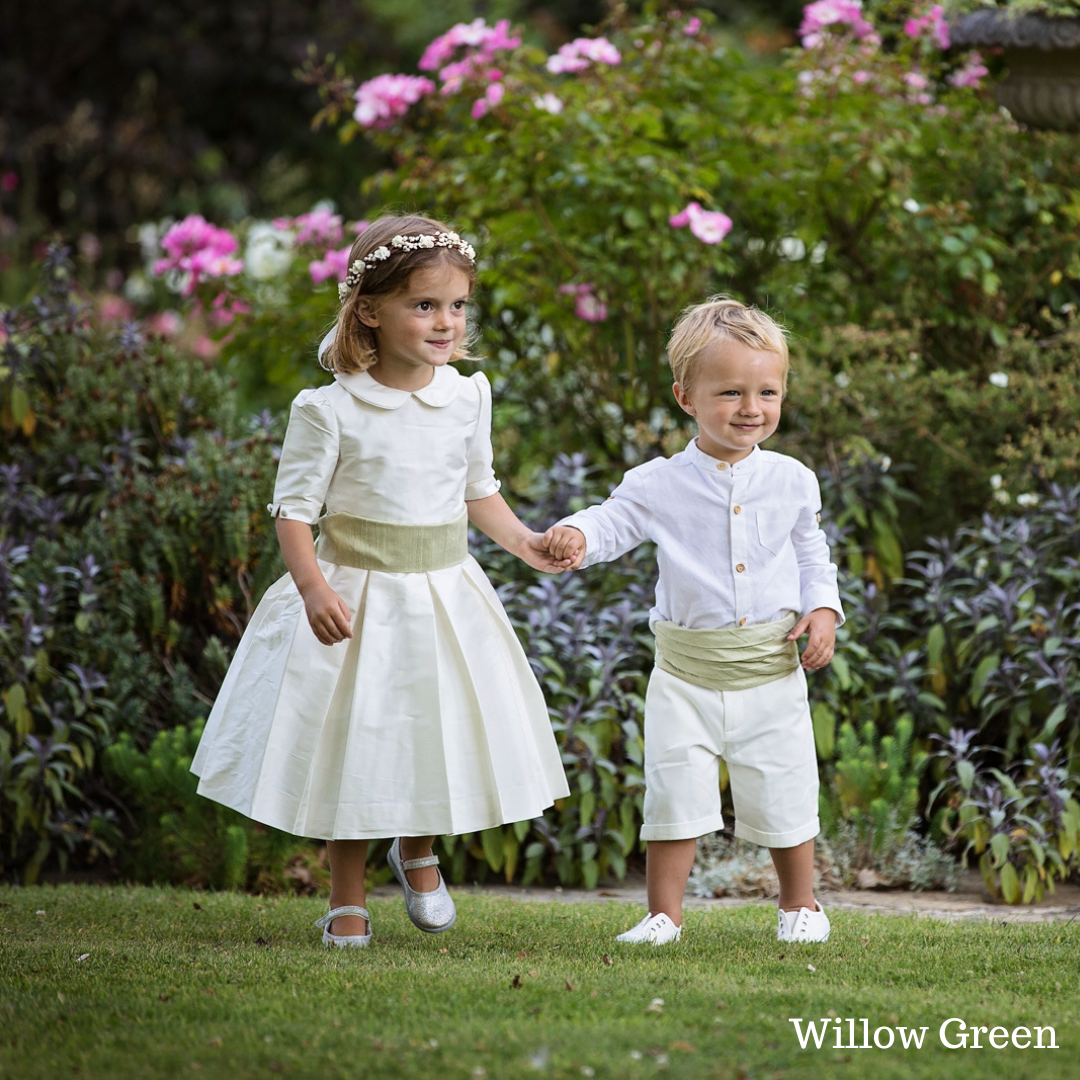 Pageboy wearing Willow Green silk cummerbunds by Amelia Brennan