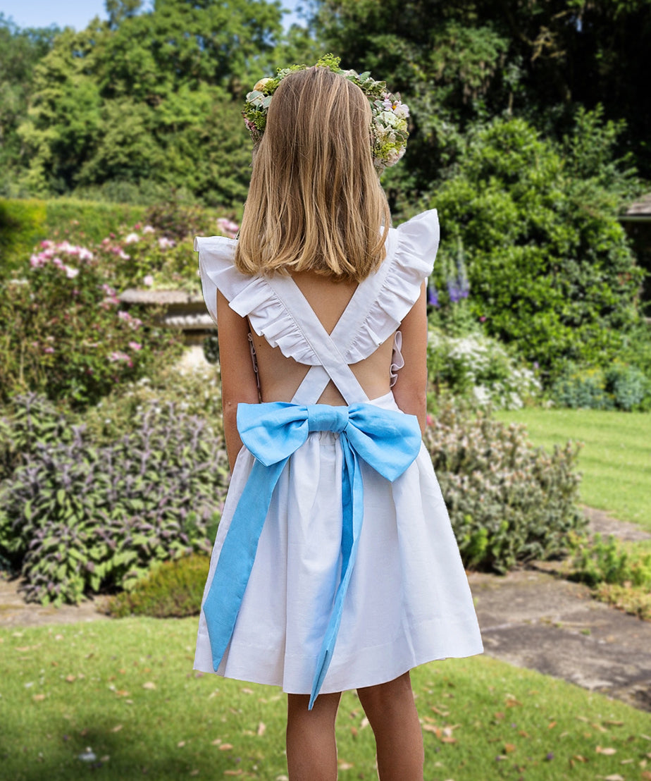Linen Cross-Back Flower Girl Dress with Blue Bow | Amelia Brennan Linen Cross-Back Flower Girl Dress with Blue Bow | Amelia Brennan