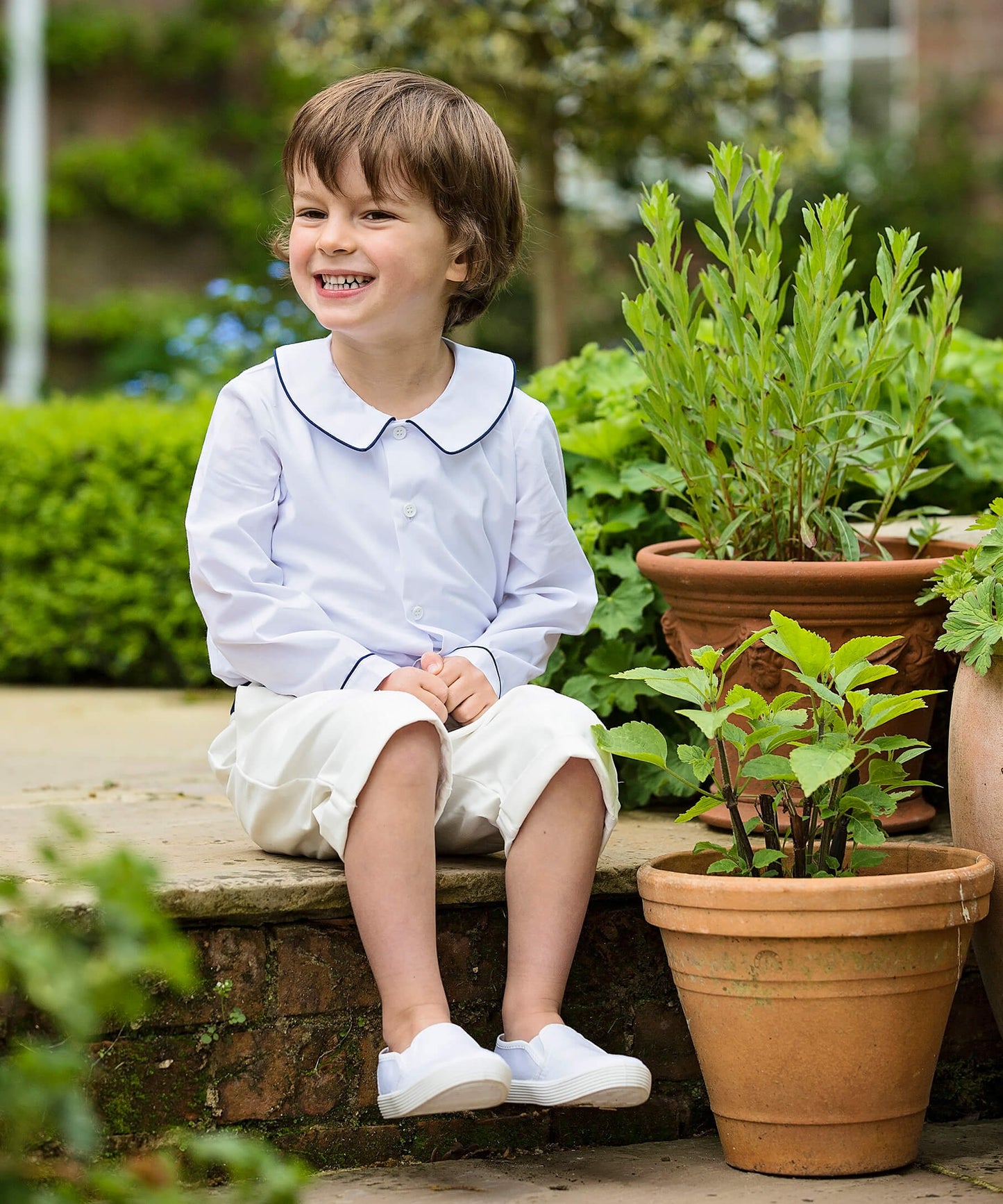 Amelia Brennan - Page Boy in white peter pan collar shirt with navy piping