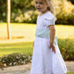 Flowergirl wears White Cienta T-Bars stocked by Amelia Brennan Weddings