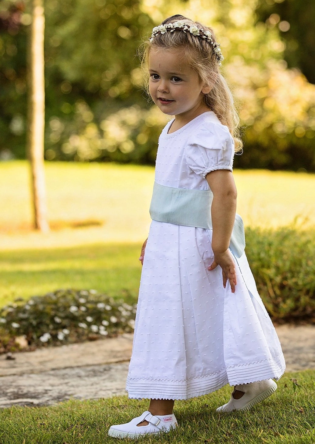 Flowergirl wears White Cienta T-Bars stocked by Amelia Brennan Weddings