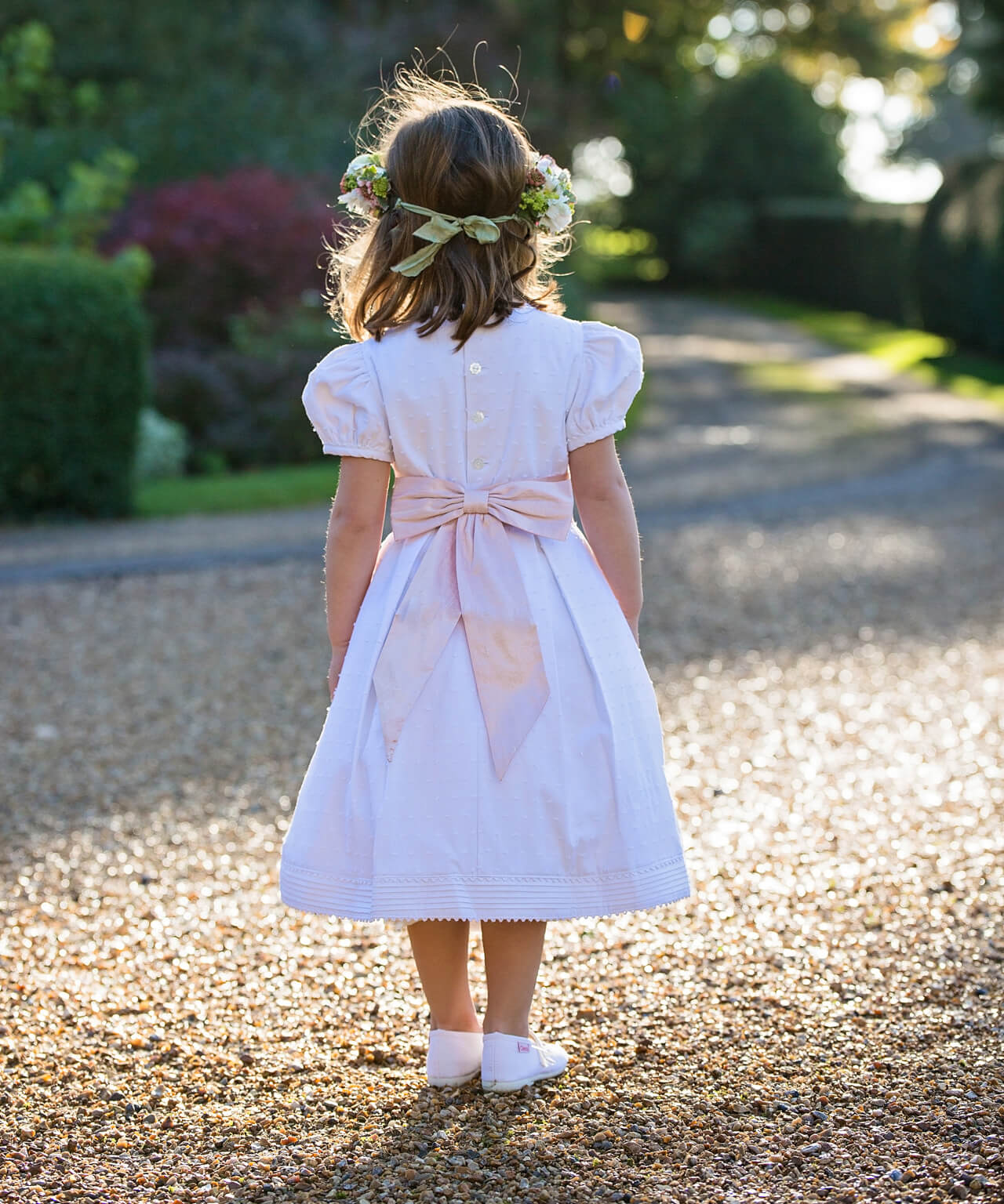 White Dot Cotton Flower Girl Dress with Blush Silk Sash by Amelia Brennan Weddings