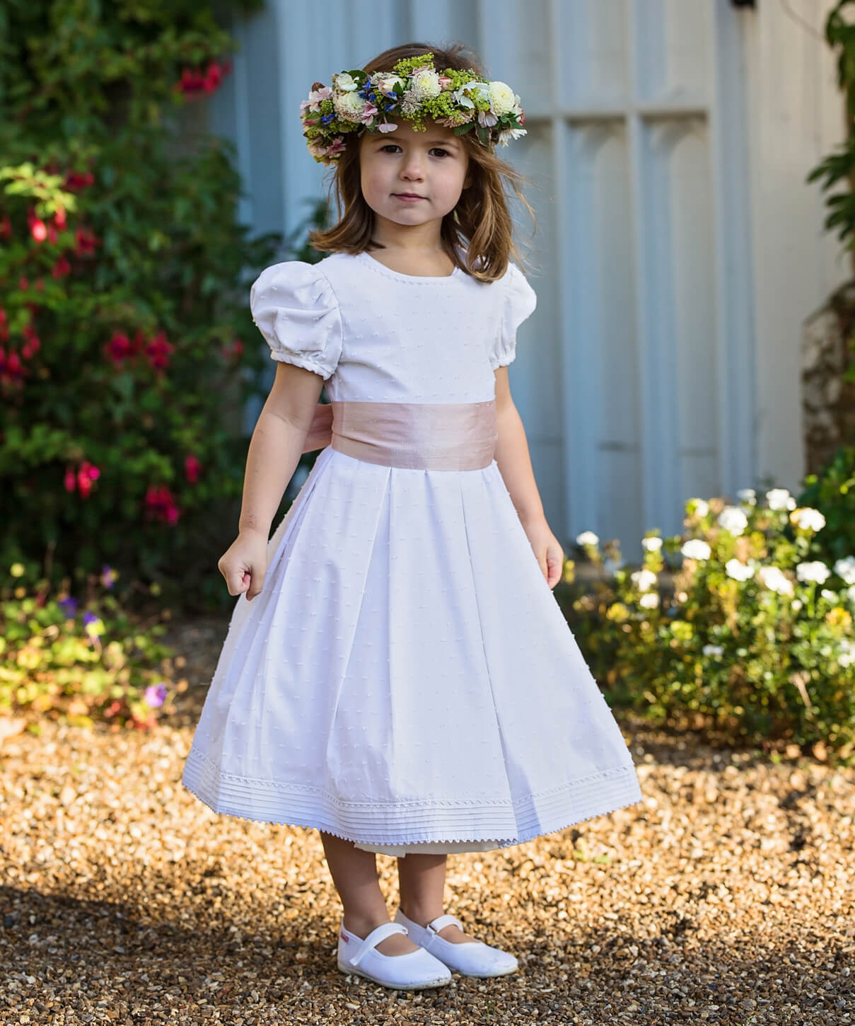 White Dot Cotton Flower Girl Dress with Blush Silk Sash by Amelia Brennan Weddings