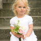 White cotton pintucked flowergirl dress by Amelia Brennan Weddings