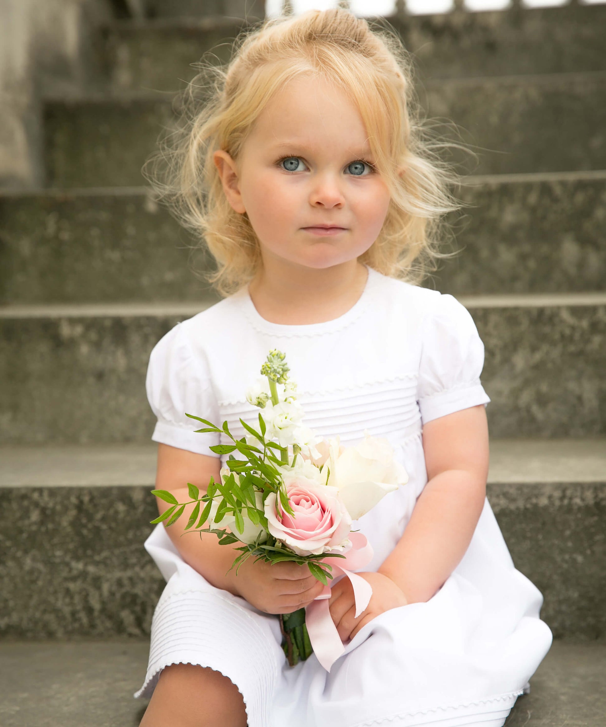 White cotton pintucked flowergirl dress by Amelia Brennan Weddings