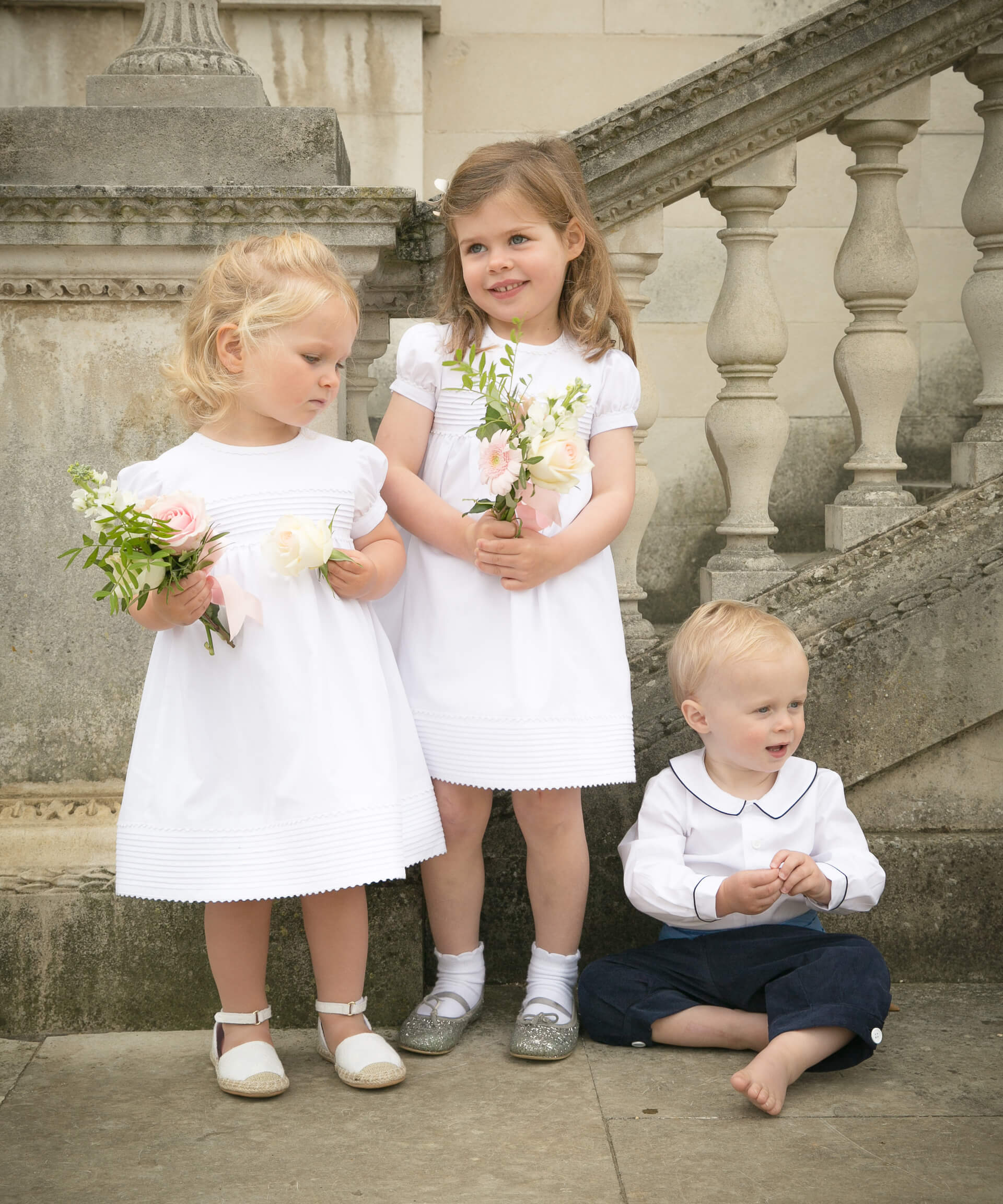 White cotton pintucked flowergirl dresses and Pageboy Outfit by Amelia Brennan Weddings