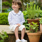 Amelia Brennan - Page Boy in white peter pan collar shirt with navy piping