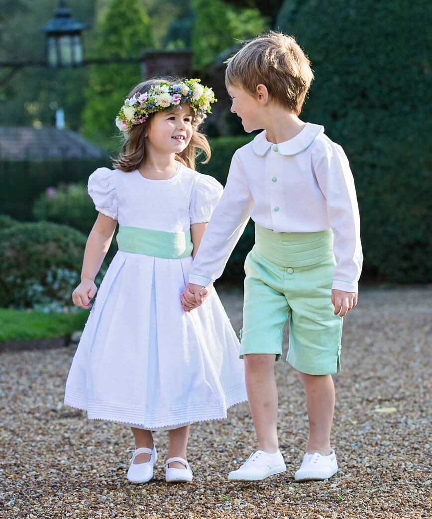 Pageboy and Flowergirl outfits in white and green linen by Amelia Brennan Weddings